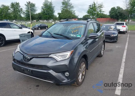 2018 Toyota Rav4 Limited from USA, damaged, VIN JTMDFREV3JD231395